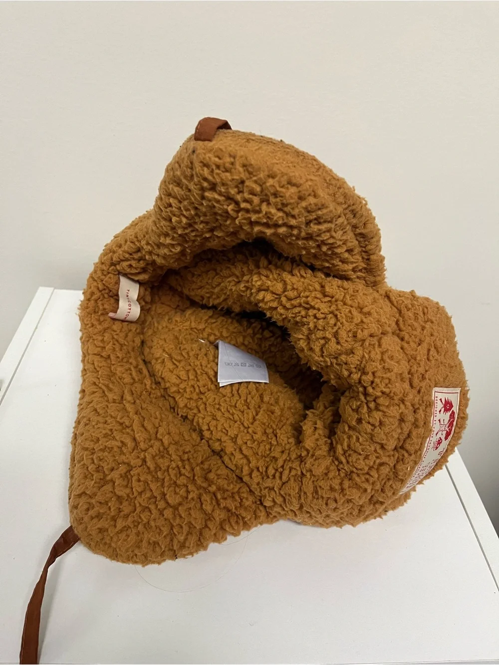 Tiny Cottons hat says